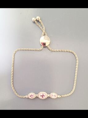 Adjustable Silver Bracelet with Pink Gem Accents